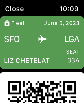 A screenshot of a flight pass on Apple Watch. The pass includes information about a flight from SFO to LGA, and appears above a QR code.