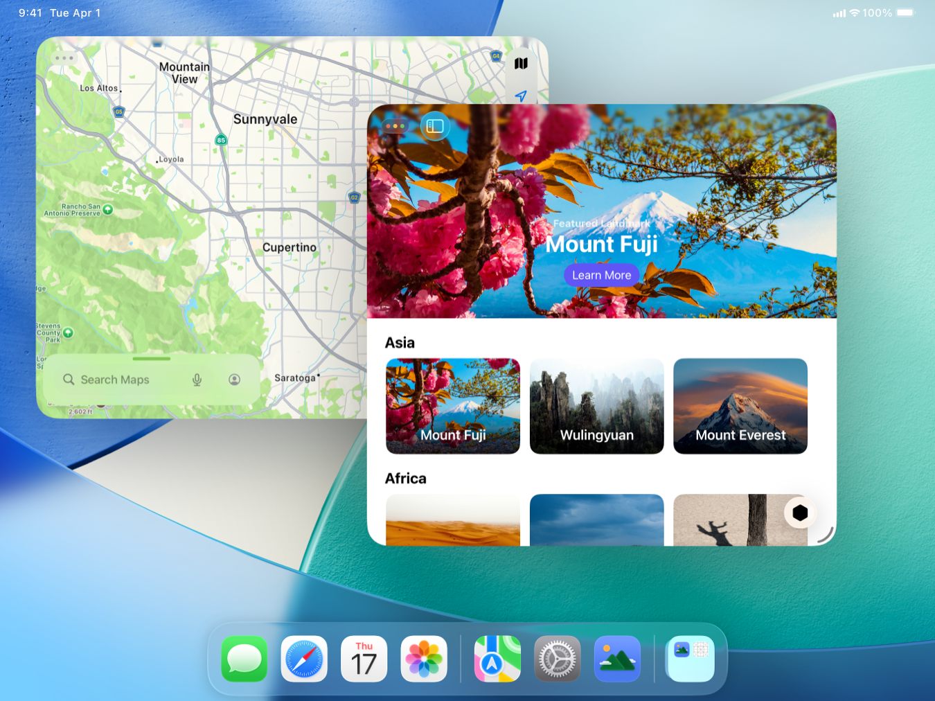 A screenshot of two windowed apps on iPad in landscape orientation. The frontmost app window overlaps and casts a shadow on the one behind it, and has colored window controls to indicate that the window is active. Both windows sit atop the Home Screen background, and the Dock appears at the bottom.
