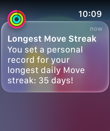 A screenshot of an Activity message that reads: you set a personal record for your longest daily Move streak, 35 days!
