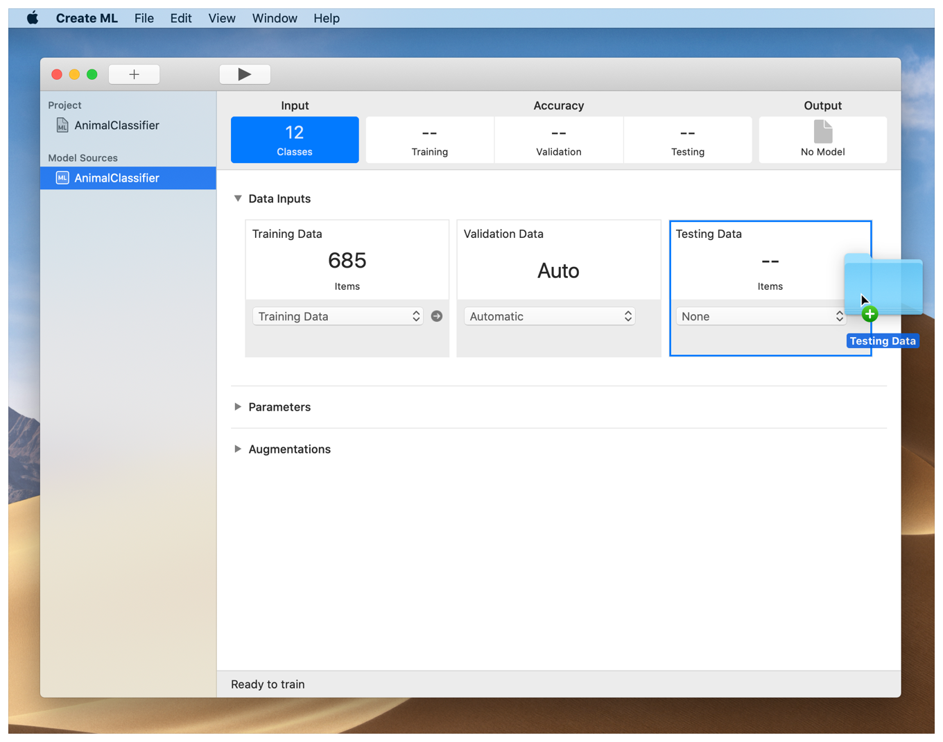 Screenshot of the project window with the highlighted segmented control cell, labeled "Input", with a Finder folder named "Testing Data" being dragged and dropped onto its Testing Data section.