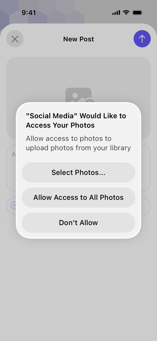 A screenshot of a permission alert for a social media app displaying a purpose string that reads Social Media Would Like to Access Your Photos. Allow access to photos to upload photos from your library. The string is followed by three buttons in a stack. From the top, the buttons are titled Select Photos, Allow Access to All Photos, and Don’t Allow.