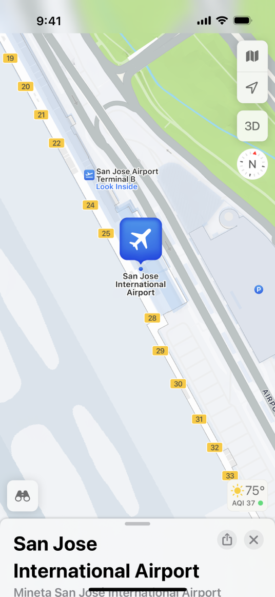A screenshot of a map on iPhone, displaying Terminal B at the San Jose International airport. Gate numbers are displayed above the terminal on the map. A minimized card containing information and options for the airport is visible at the bottom of the screen.