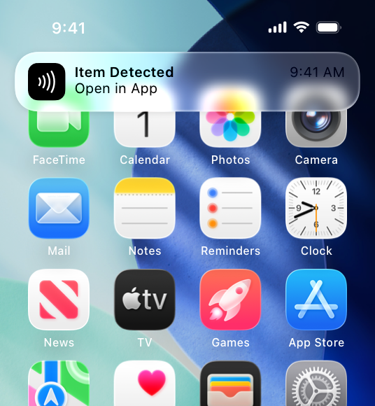 An illustration of a notification banner above the Home screen on iPhone, which offers an opportunity to open a specific app to process NFC tag data detected nearby.